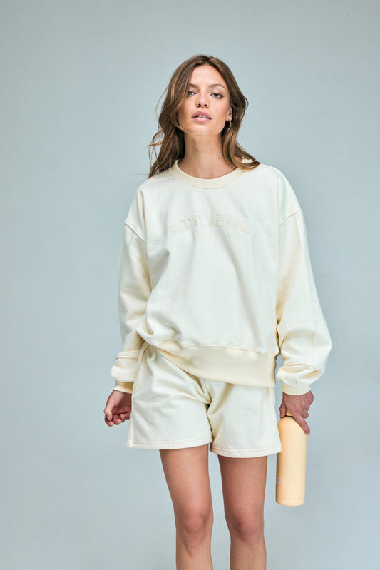 Poleron Crew Neck Bordado Active Apparel_Mantequilla